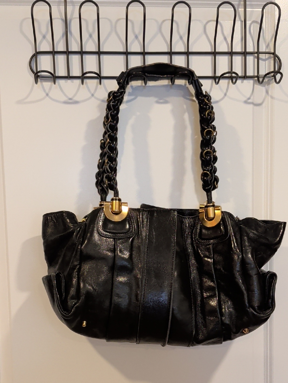 Black Leather Shoulder Bag with Gold Accents